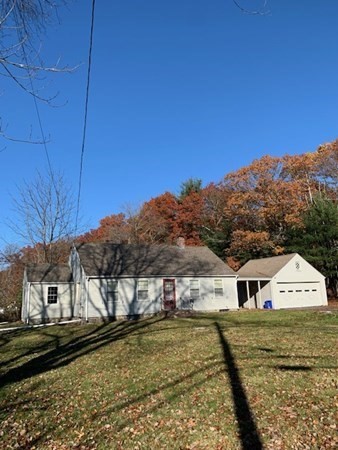 407 High Plain Road Andover, MA 01810 - Photo 1 of 25 a front view of a house with a yard
