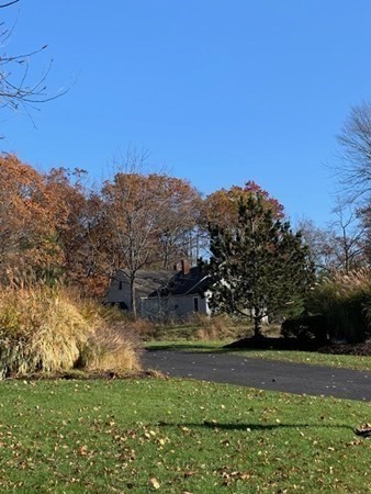 407 High Plain Road Andover, MA 01810 - Photo 12 of 25 a view of a yard with an outdoor space