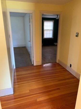407 High Plain Road Andover, MA 01810 - Photo 20 of 25 a view of hallway with wooden floor