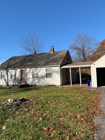 407 High Plain Road Andover, MA 01810 - Photo 3 of 25 a front view of a house with a yard