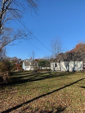 407 High Plain Road Andover, MA 01810 - Photo 5 of 25 a view of a house with a yard