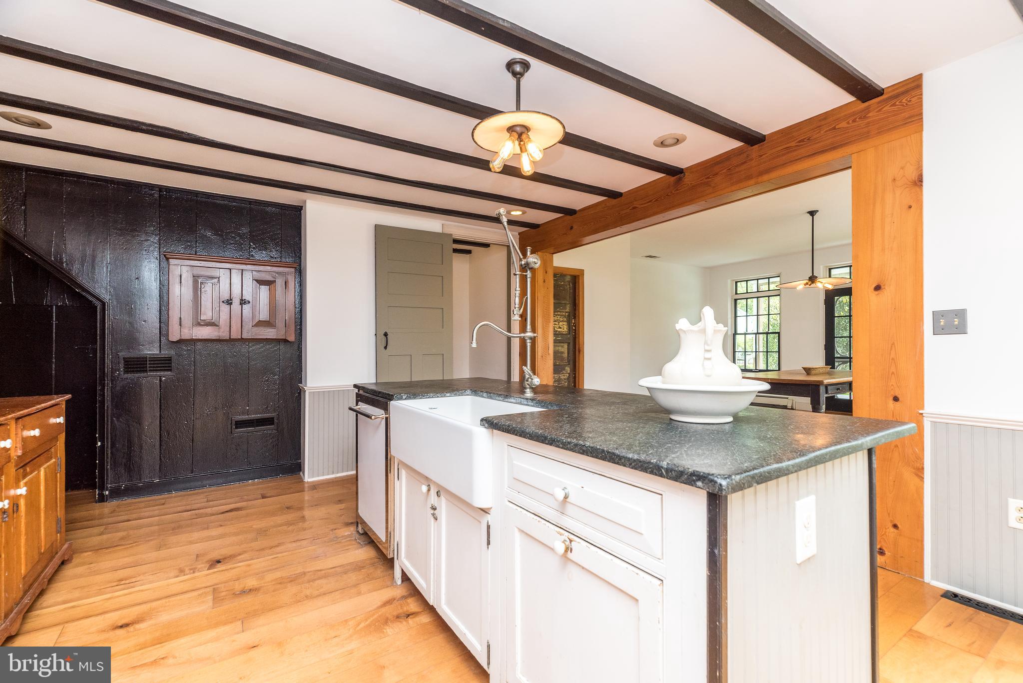 1341 Durham Road New Hope, PA 18938 - Photo 39 of 75 a kitchen with stainless steel appliances granite countertop a sink and cabinets