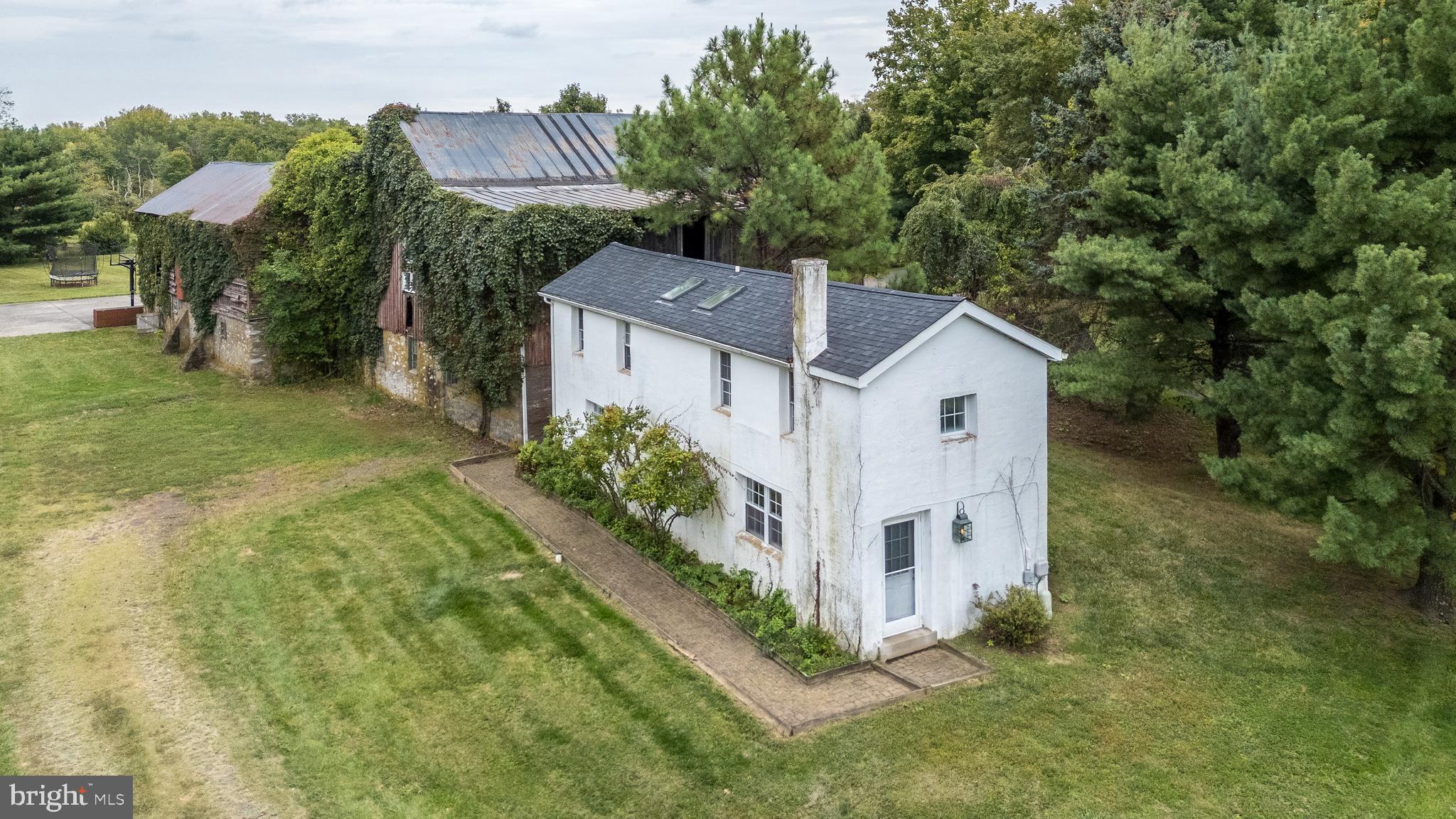 1341 Durham Road New Hope, PA 18938 - Photo 75 of 75 a aerial view of a house next to a big yard and large trees