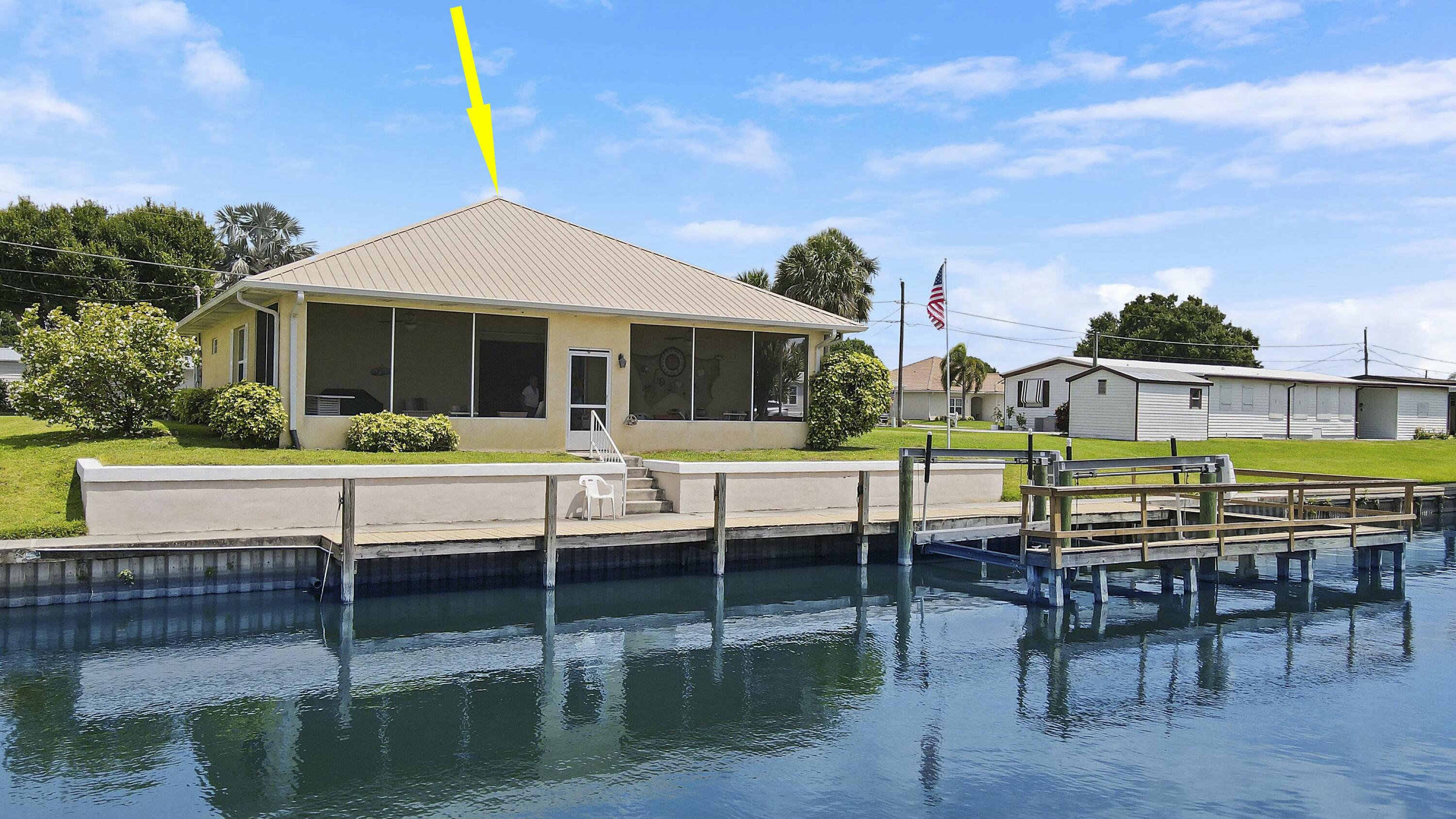 1914 Southeast 30th Street Okeechobee, FL 34974 - Photo 3 of 41 a view of house with a yard and sitting area