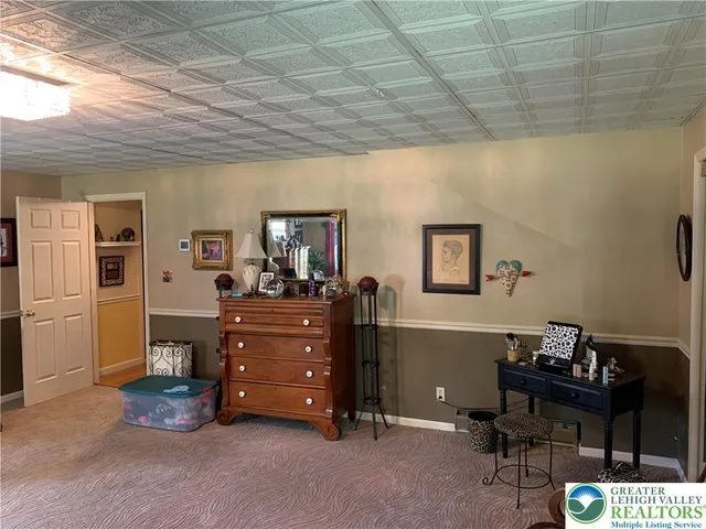 a room with furniture and a piano table