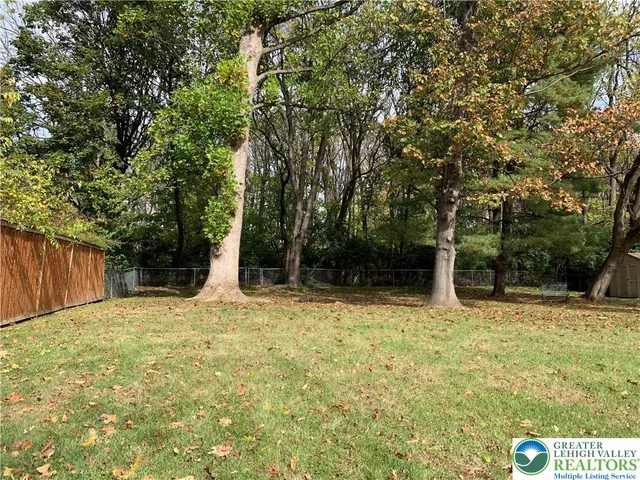 a house with trees in front of it