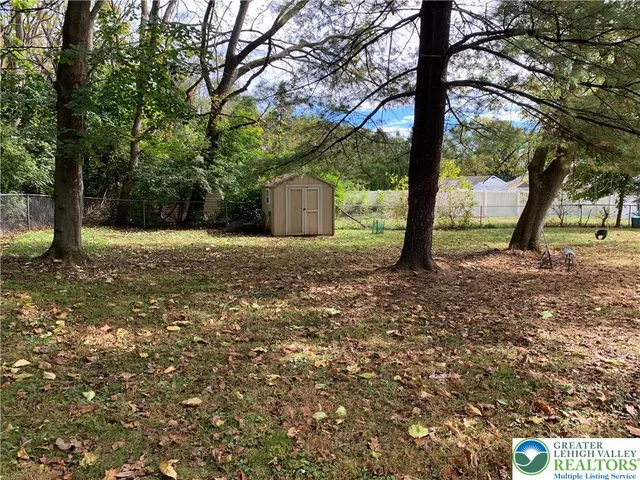 a fire hydrant in the middle of a field