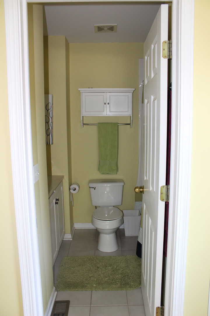 481 River Bend Road, Unit 107 Naperville, IL 60540 - Photo 8 of 17 a bathroom with a toilet