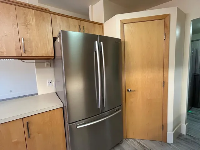 a view of an empty walk in closet