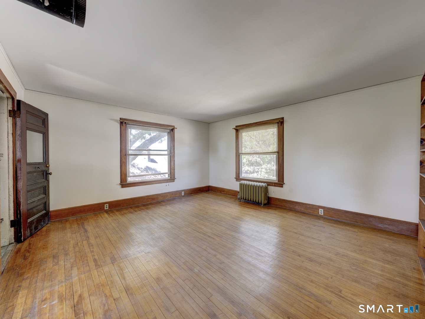 81 Chestnut Street Windham, CT 06226 - Photo 24 of 40 Second Floor Family room with entry to sleeping porch