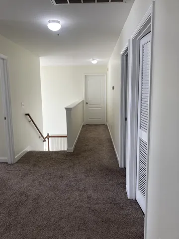 a view of a lake in middle of the town