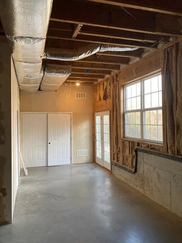a view of swimming pool with an outdoor space and seating area