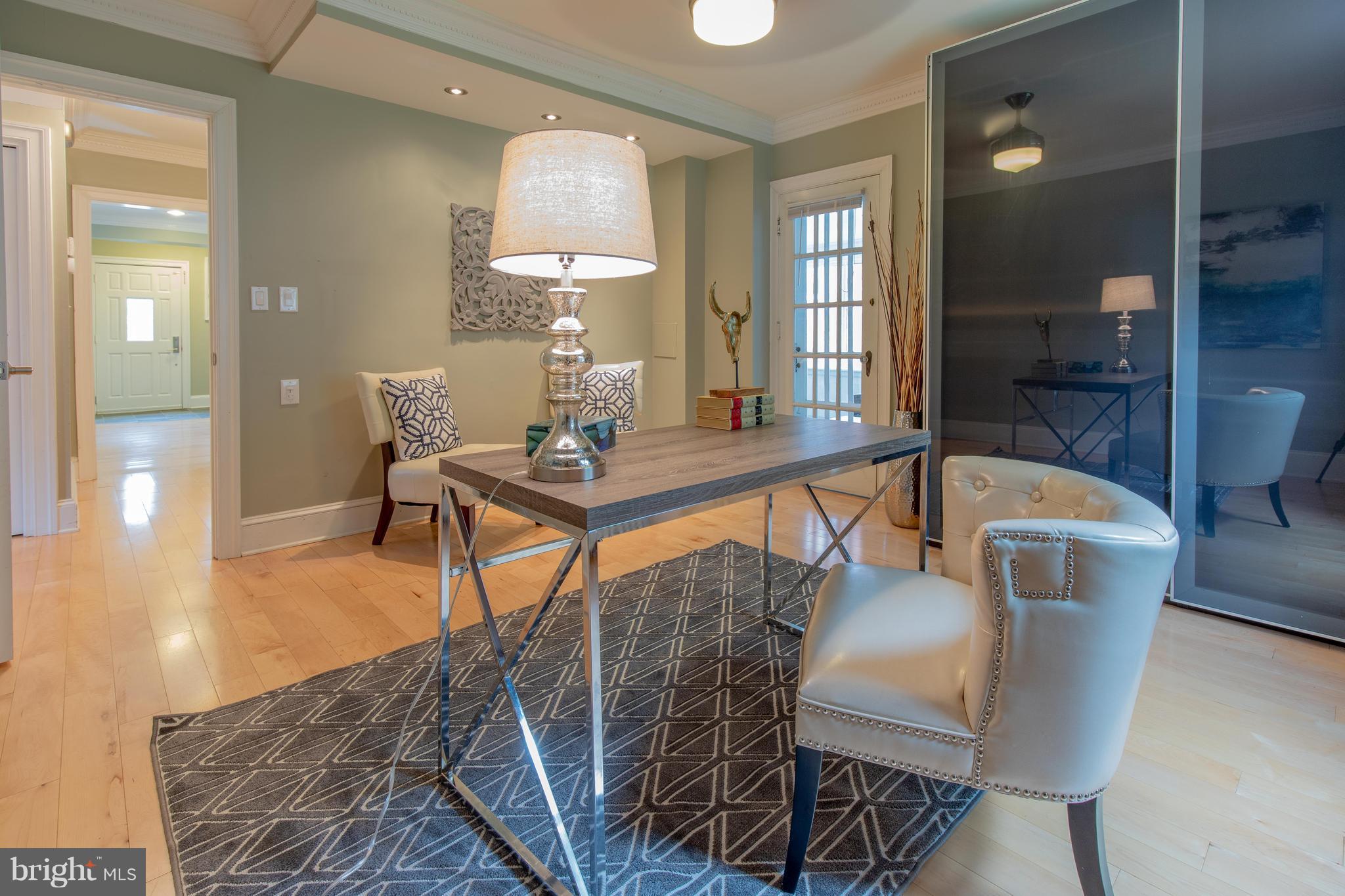 9940 Moss Avenue Silver Spring, MD 20901 - Photo 17 of 30 a dining room with furniture and wooden floor