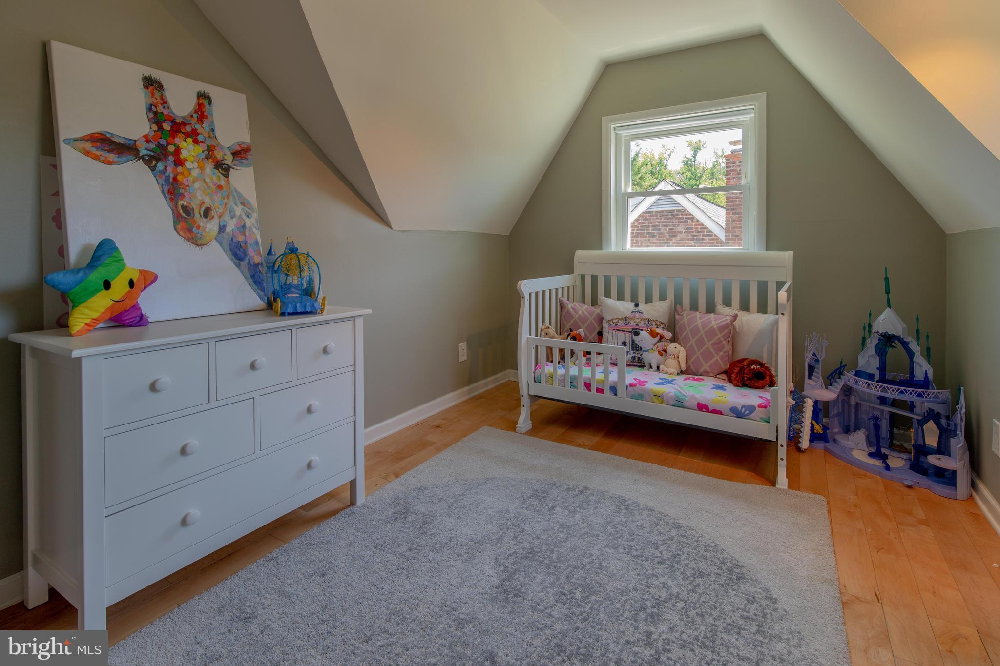9940 Moss Avenue Silver Spring, MD 20901 - Photo 24 of 30 a bedroom with furniture and a couch