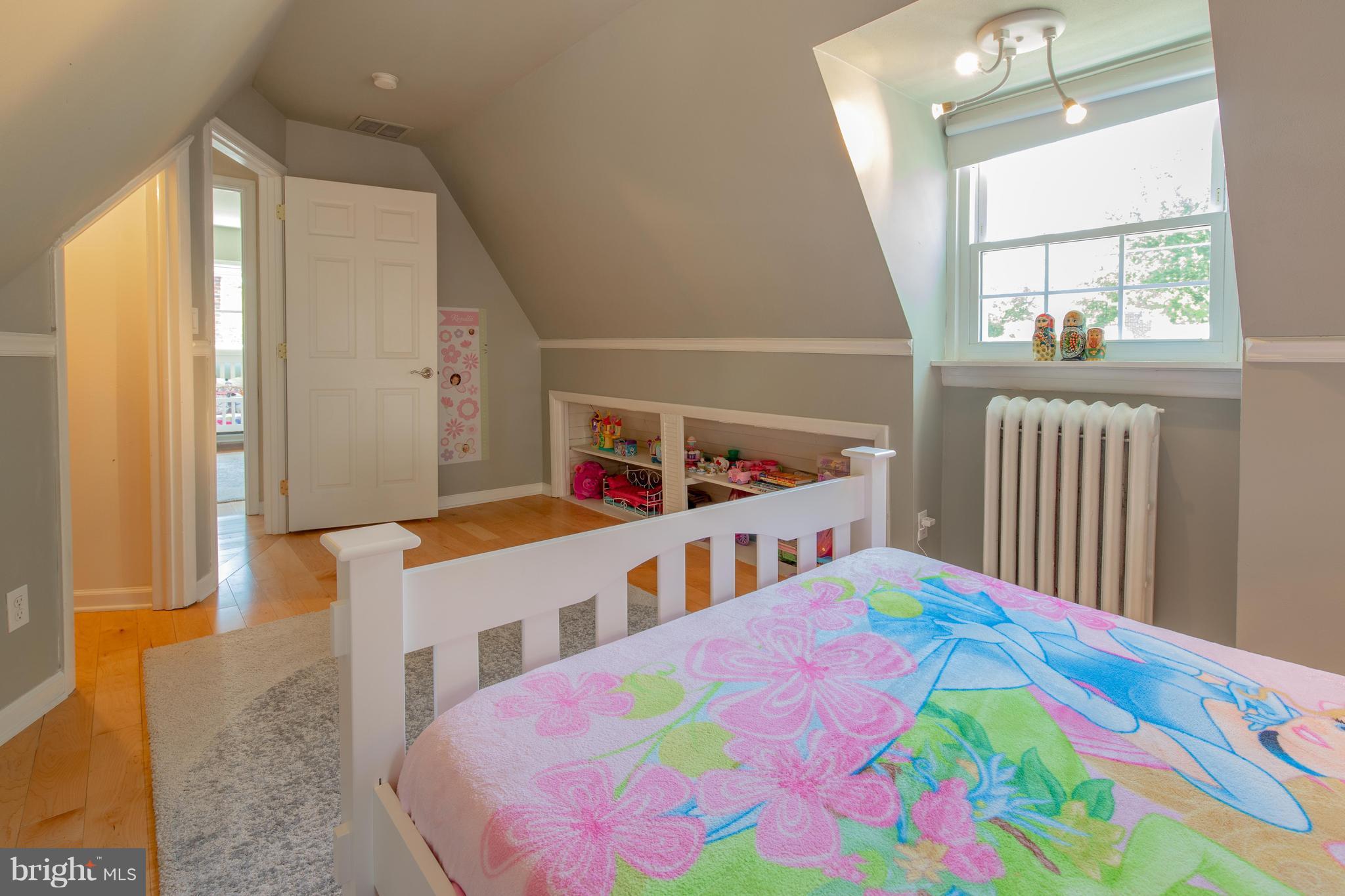 9940 Moss Avenue Silver Spring, MD 20901 - Photo 28 of 30 a bedroom with a bed and a window