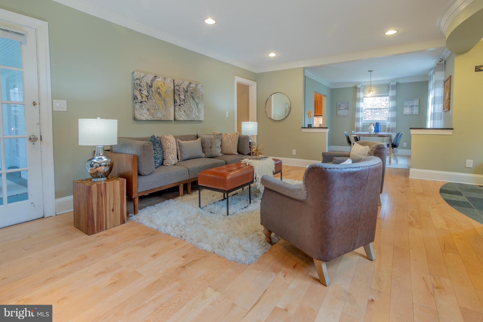 9940 Moss Avenue Silver Spring, MD 20901 - Photo 6 of 30 a living room with furniture and a wooden floor