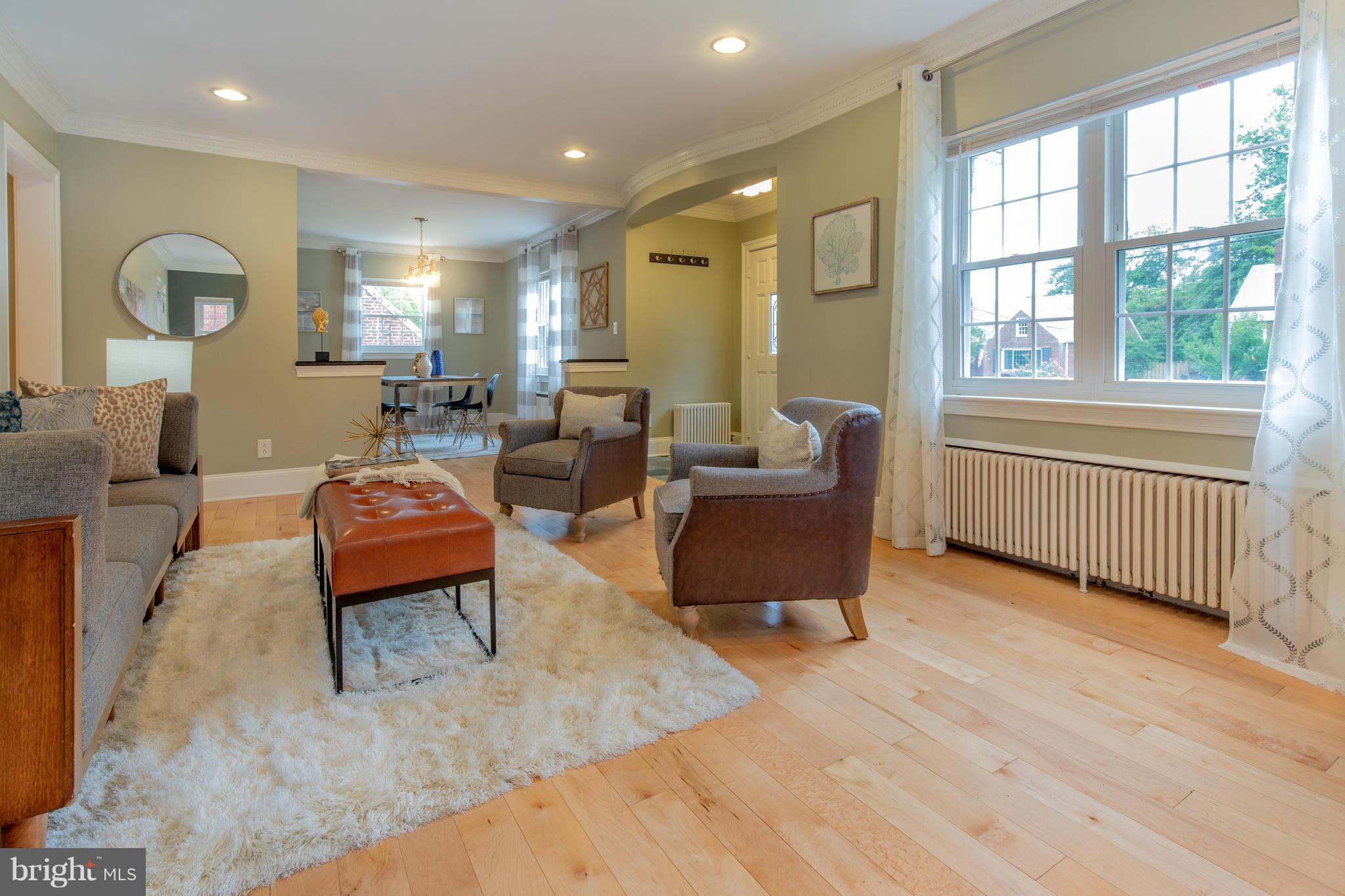 9940 Moss Avenue Silver Spring, MD 20901 - Photo 7 of 30 a living room with furniture and a large window