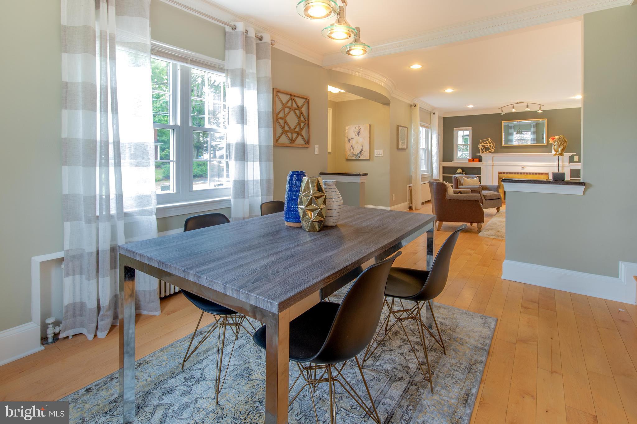 9940 Moss Avenue Silver Spring, MD 20901 - Photo 10 of 30 a view of a dining room and livingroom