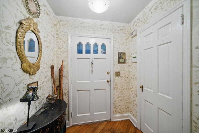 351 Franklin Road Denville, NJ 07834 - Photo 15 of 48 a bathroom with a sink and a mirror