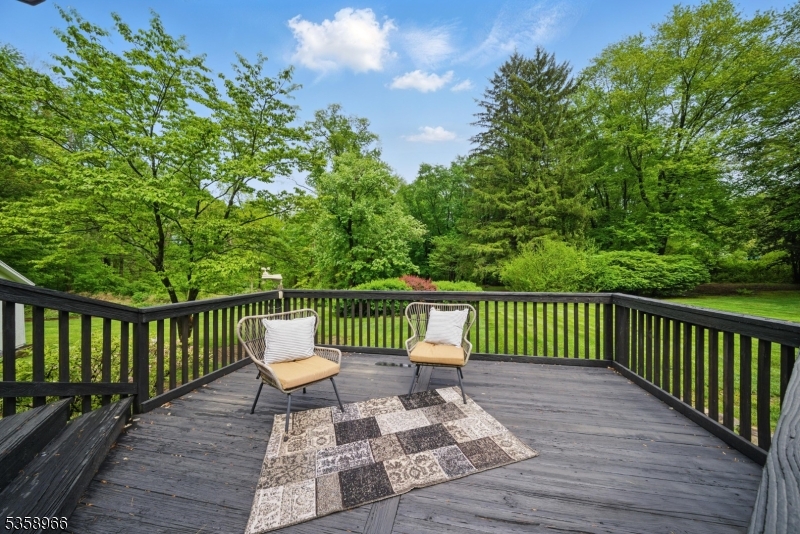 351 Franklin Road Denville, NJ 07834 - Photo 2 of 48 a view of a deck with a chair