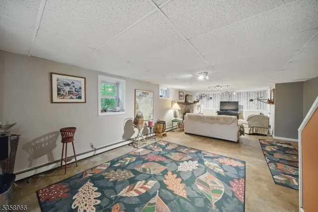 a bed room with furniture and a window