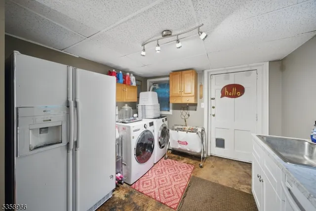 a view of kitchen with washer and dryer