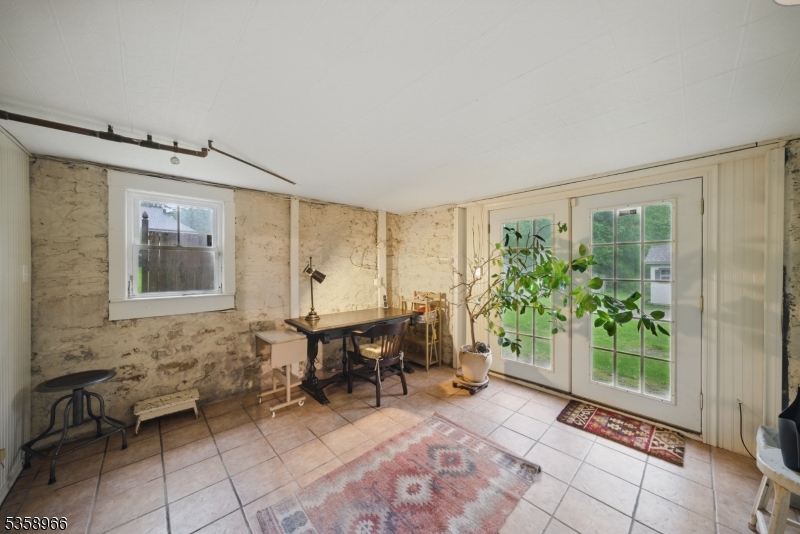 351 Franklin Road Denville, NJ 07834 - Photo 27 of 48 a view of a livingroom with furniture and front door