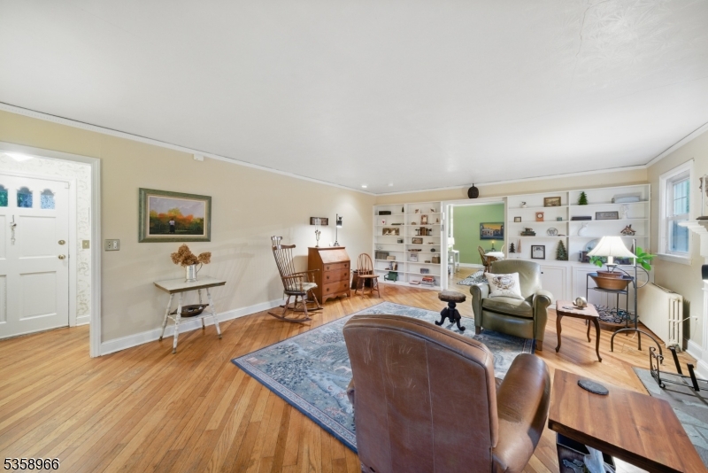 351 Franklin Road Denville, NJ 07834 - Photo 32 of 48 a living room with furniture and a wooden floor