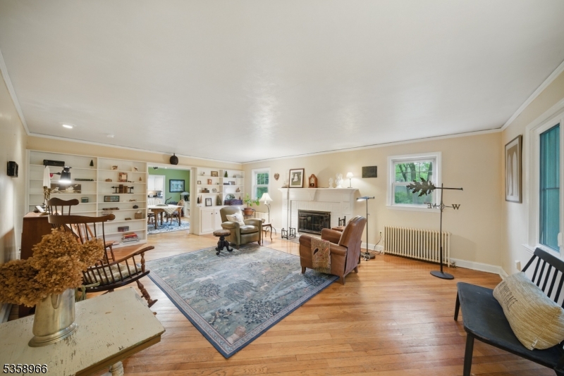 351 Franklin Road Denville, NJ 07834 - Photo 4 of 48 a living room with furniture and a fireplace