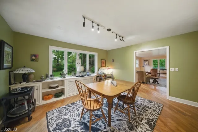 a outdoor space with furniture lots of dining room and wooden floor