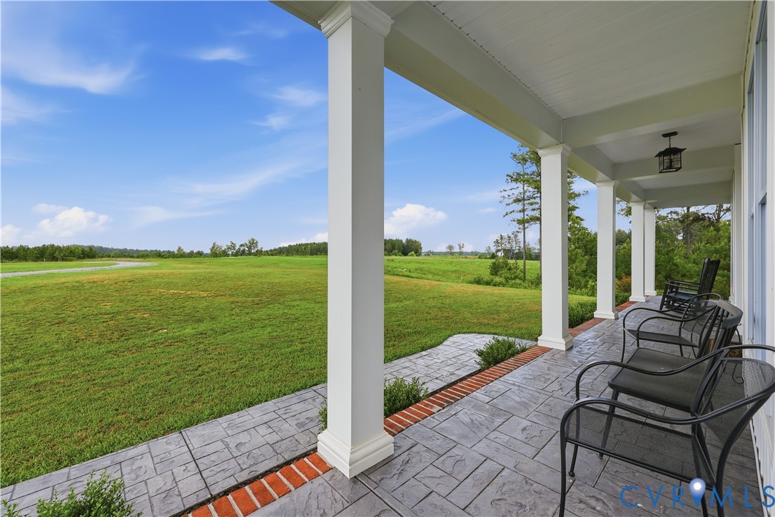 25181 West Soap Stone Road Jetersville, VA 23083 - Photo 6 of 54 Expansive covered front porch featuring a stamped