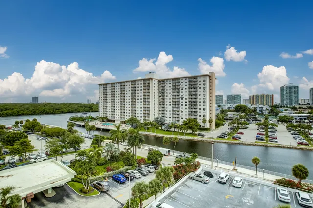 a view of a city with lawn chairs