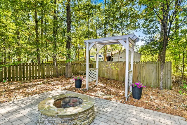 a view of swimming pool with a patio