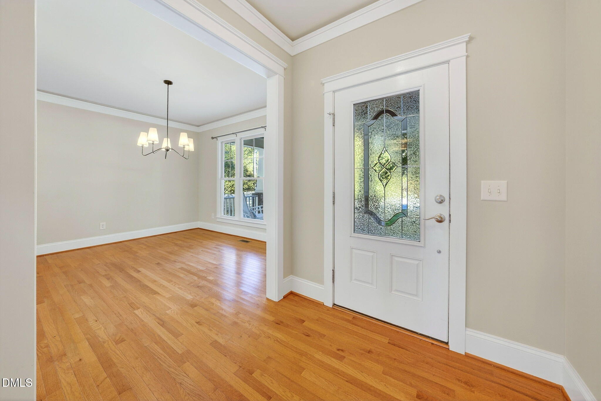 4324 Brighton Ridge Drive Apex, NC 27539 - Photo 4 of 37 wooden floor in an empty room with a window