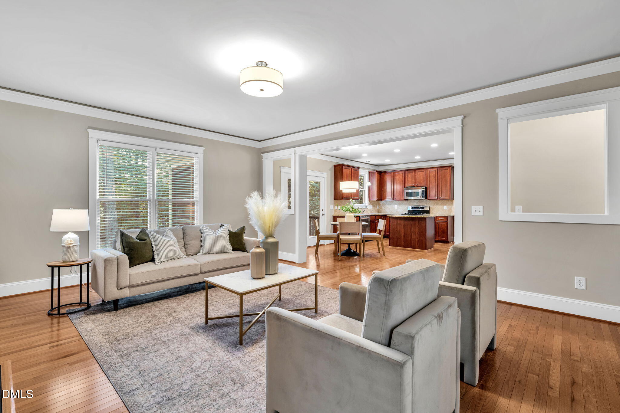 4324 Brighton Ridge Drive Apex, NC 27539 - Photo 7 of 37 a living room with furniture and a large window