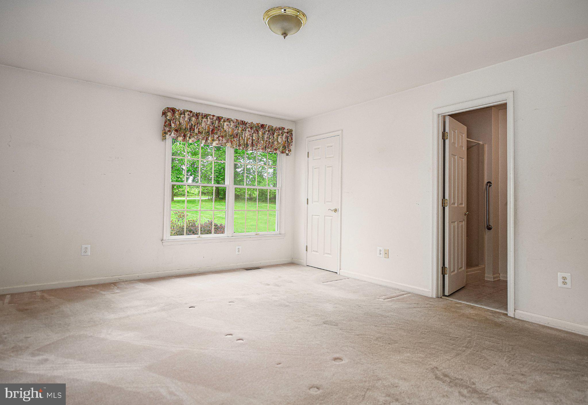 711 Gilbert Road Aberdeen, MD 21001 - Photo 14 of 54 a view of an empty room with a window
