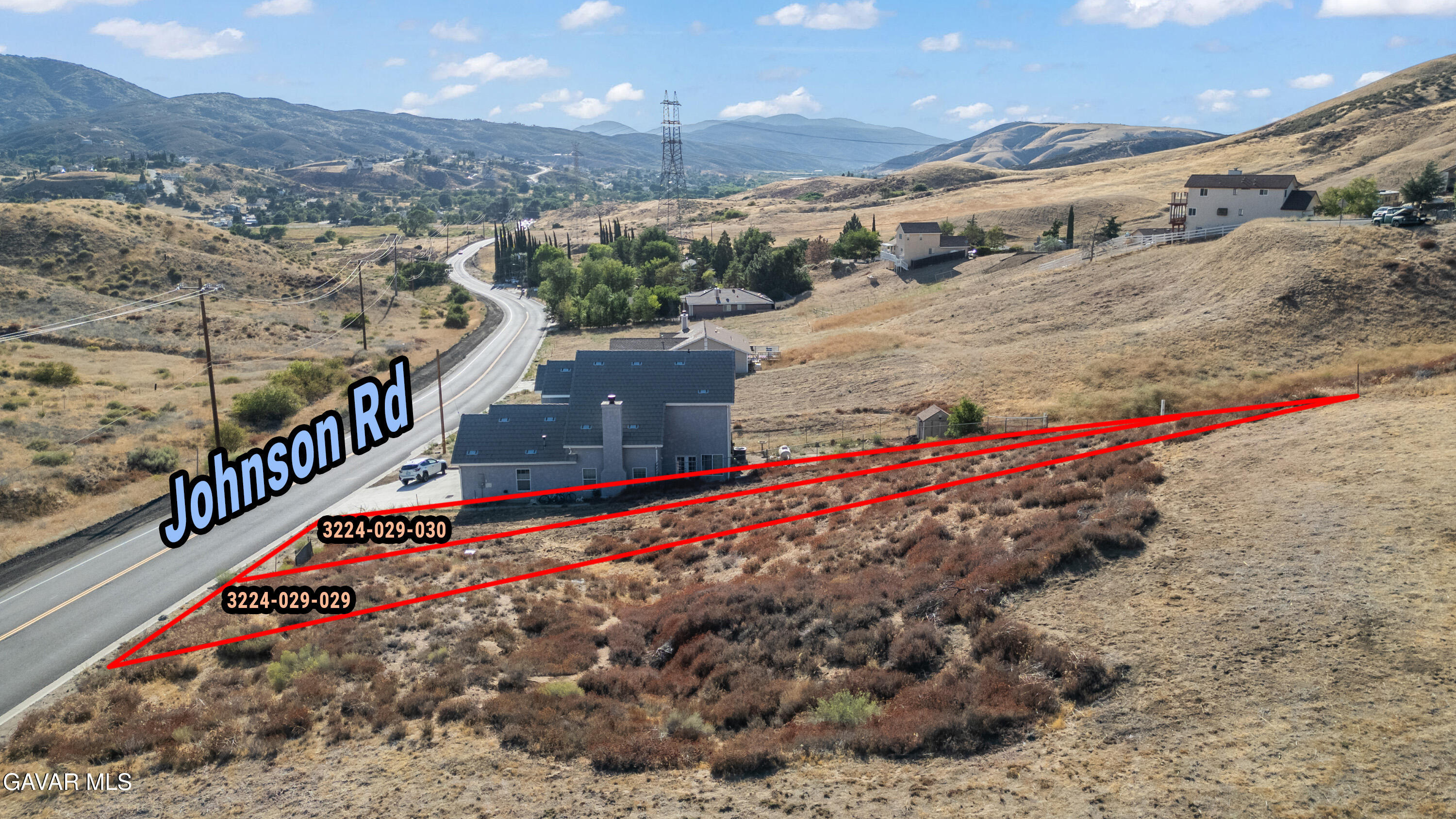 a view of a pathway with a building in the background