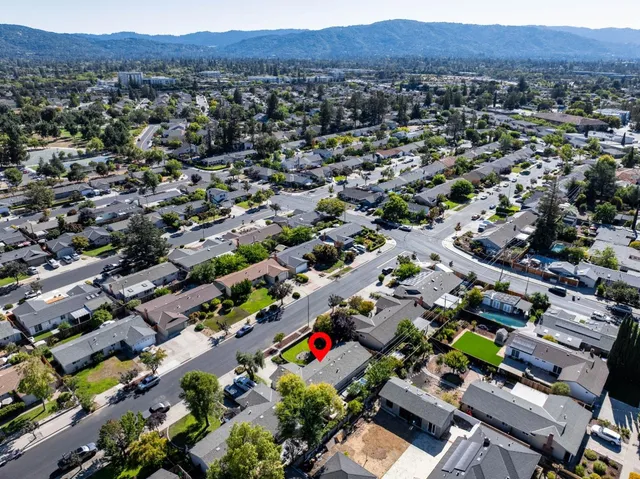 an aerial view of a city with lots of residential buildings