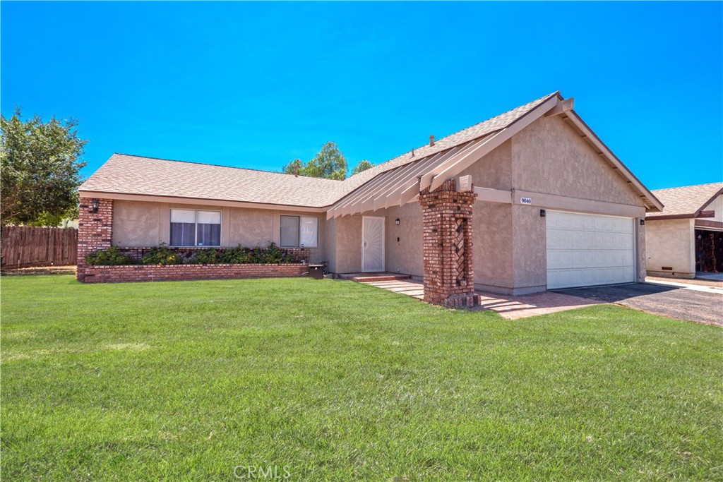 9040 Daytona Avenue Riverside, CA 92503 - Photo 1 of 1 *Lawn and hedge have been digitally edited.