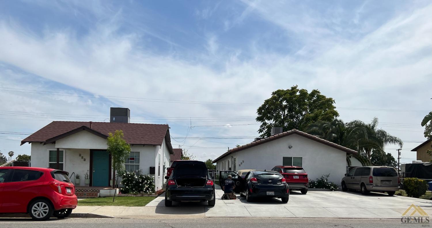 a car parked in front of a house