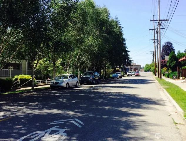 a view of a street with houses