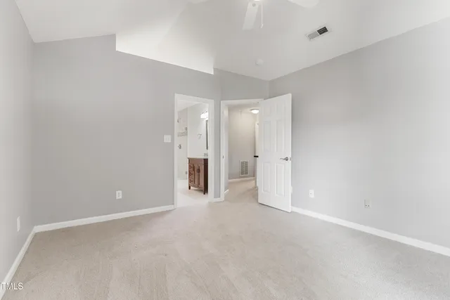 a bathroom with a sink mirror toilet and shower