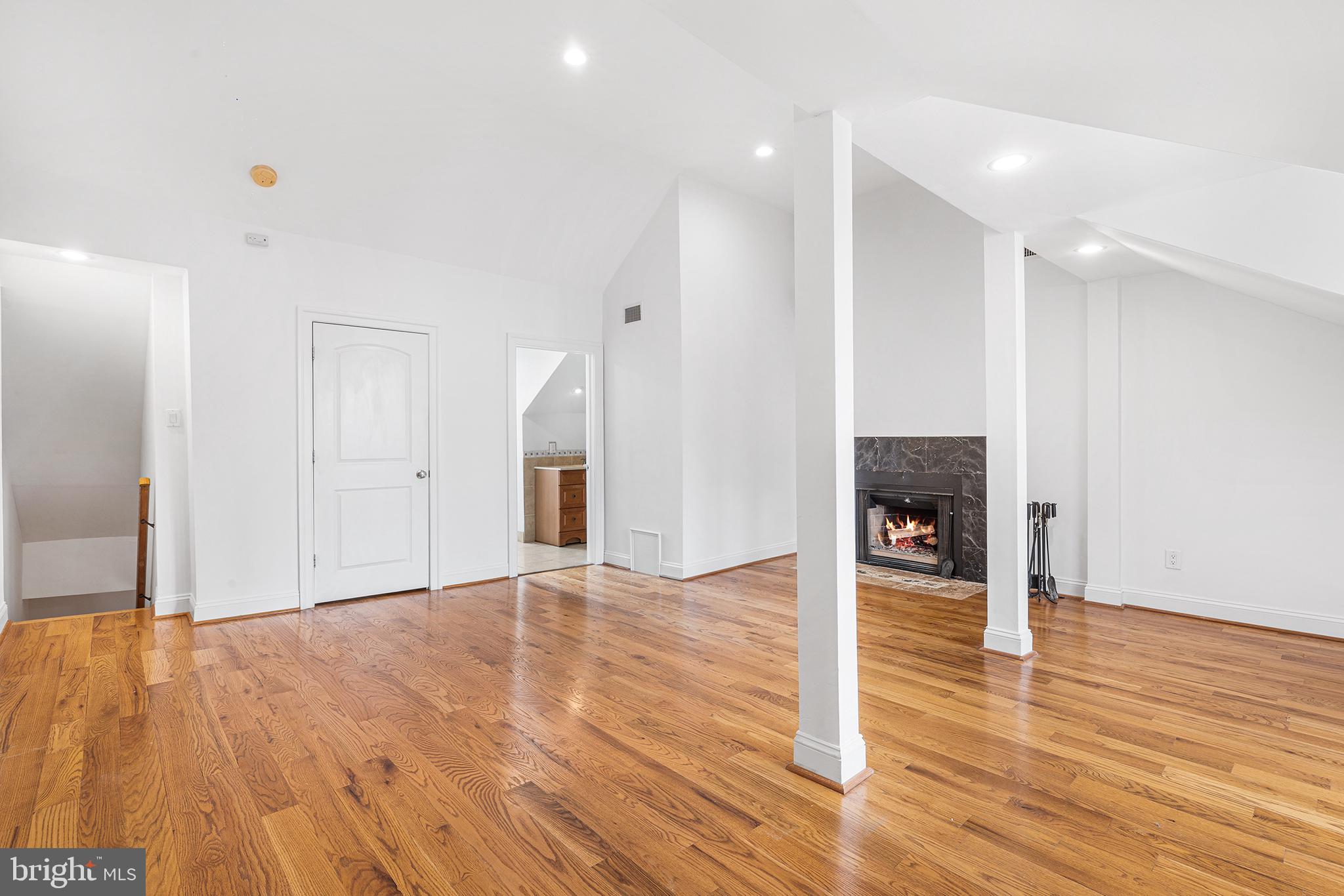 902 Pine Street, Unit 3F Philadelphia, PA 19107 - Photo 11 of 22 a view of empty room with wooden floor