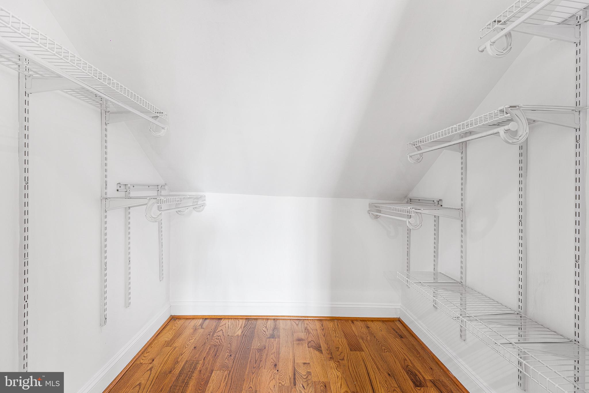 902 Pine Street, Unit 3F Philadelphia, PA 19107 - Photo 14 of 22 a view of a room with wooden floor and window