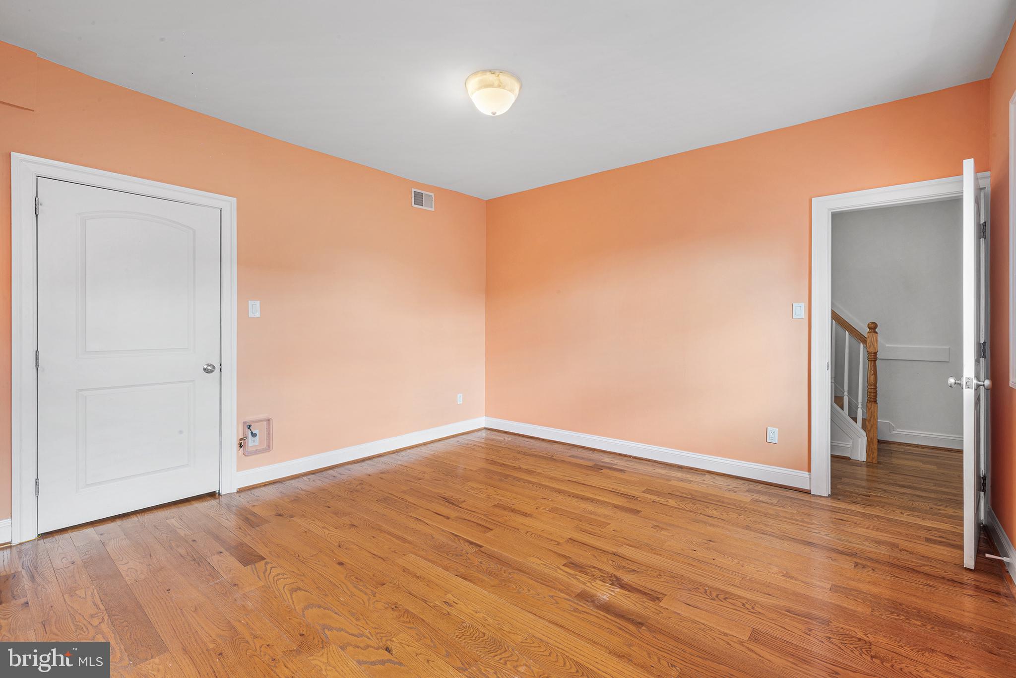 902 Pine Street, Unit 3F Philadelphia, PA 19107 - Photo 18 of 22 wooden floor in an empty room