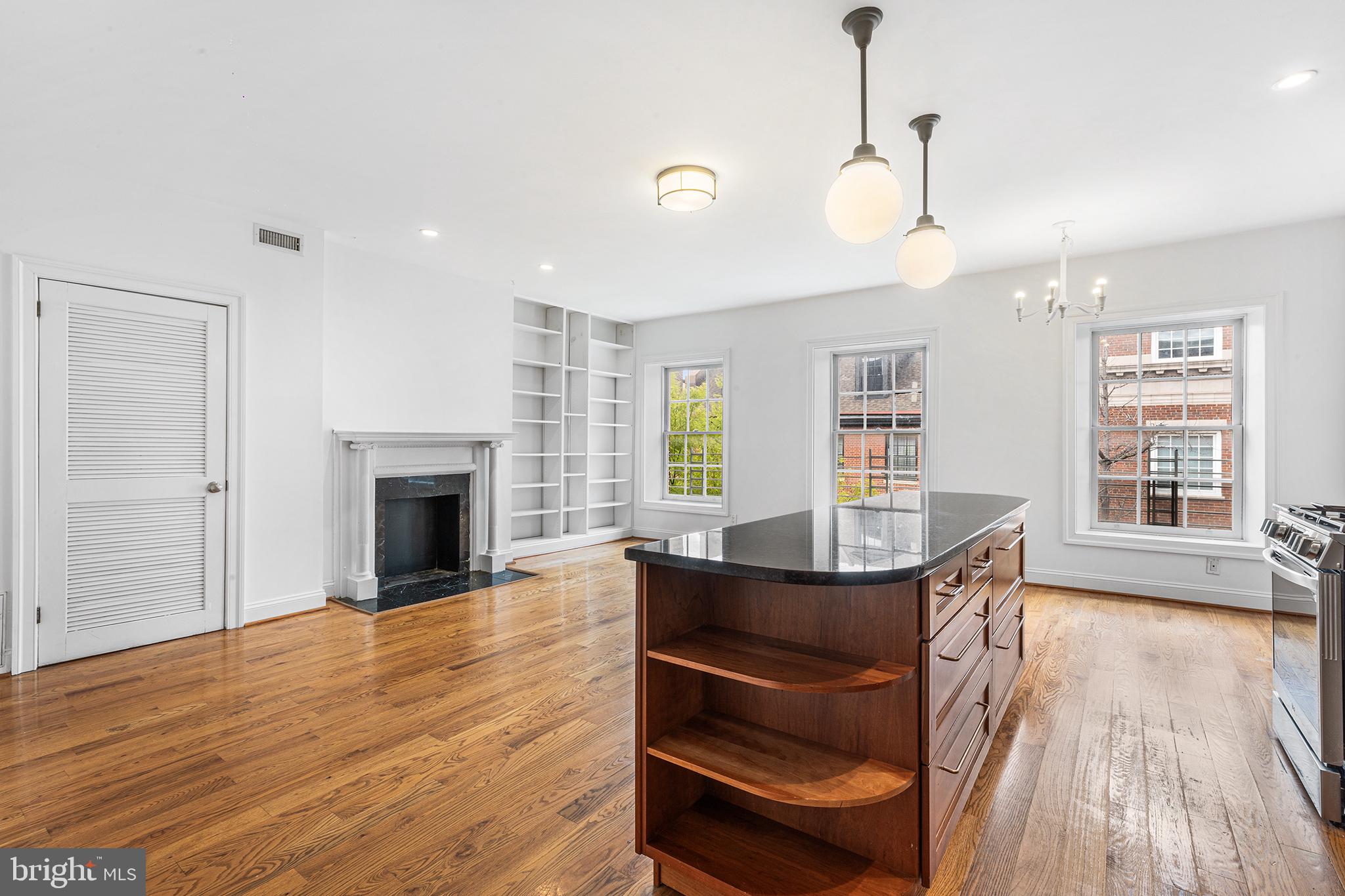 902 Pine Street, Unit 3F Philadelphia, PA 19107 - Photo 2 of 22 a view of kitchen and dining room with wooden floor
