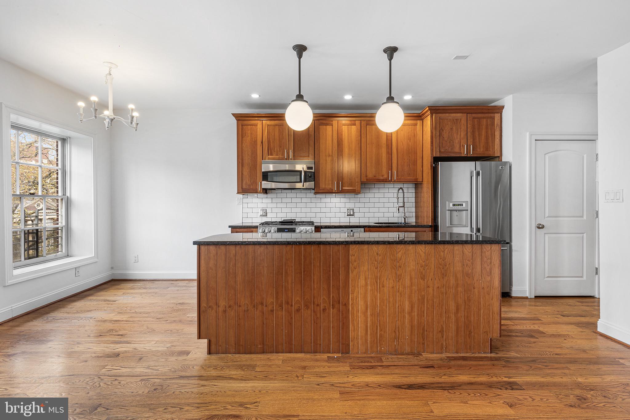 902 Pine Street, Unit 3F Philadelphia, PA 19107 - Photo 7 of 22 a view of kitchen and window