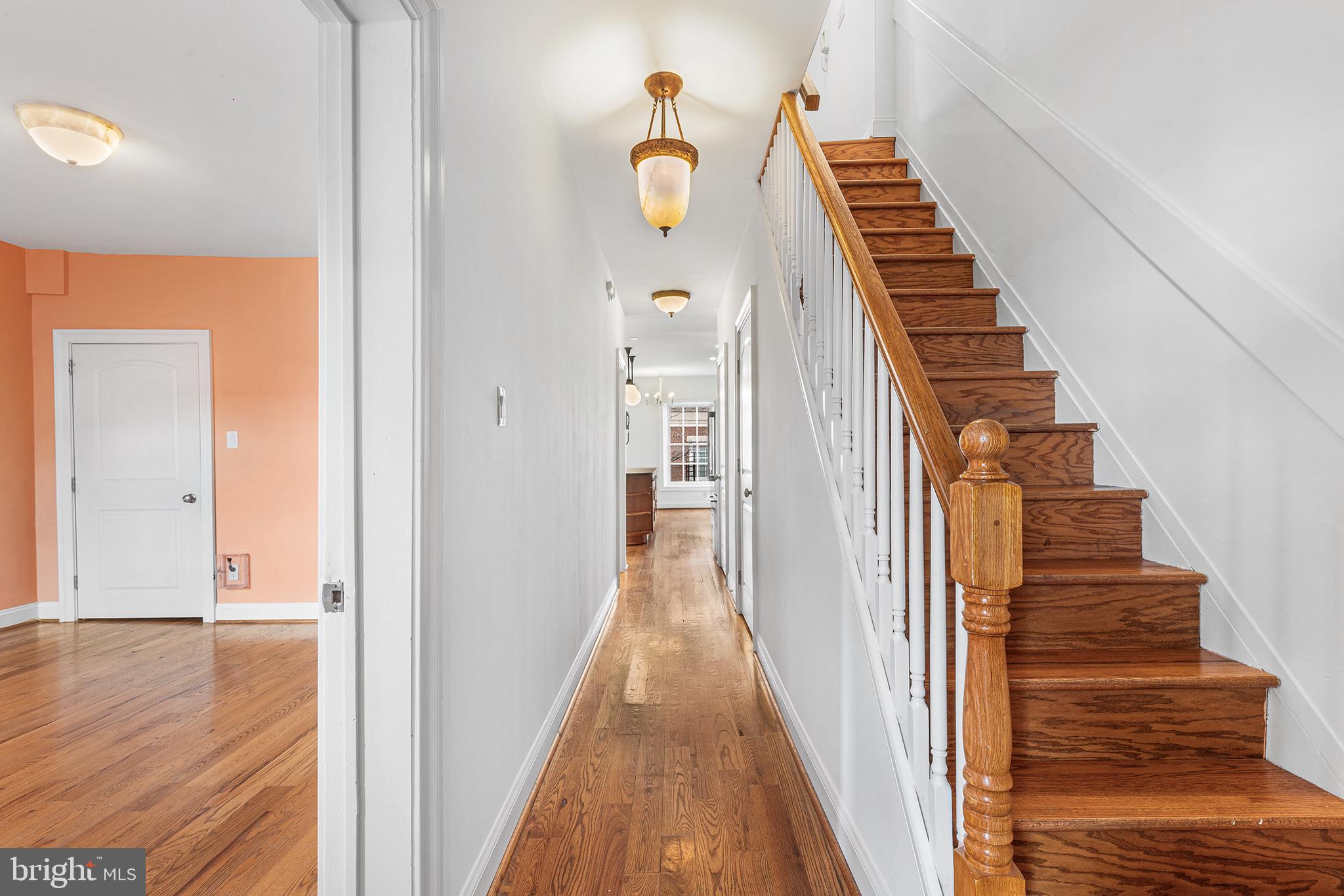 902 Pine Street, Unit 3F Philadelphia, PA 19107 - Photo 9 of 22 a view of a hallway with wooden floor and entryway