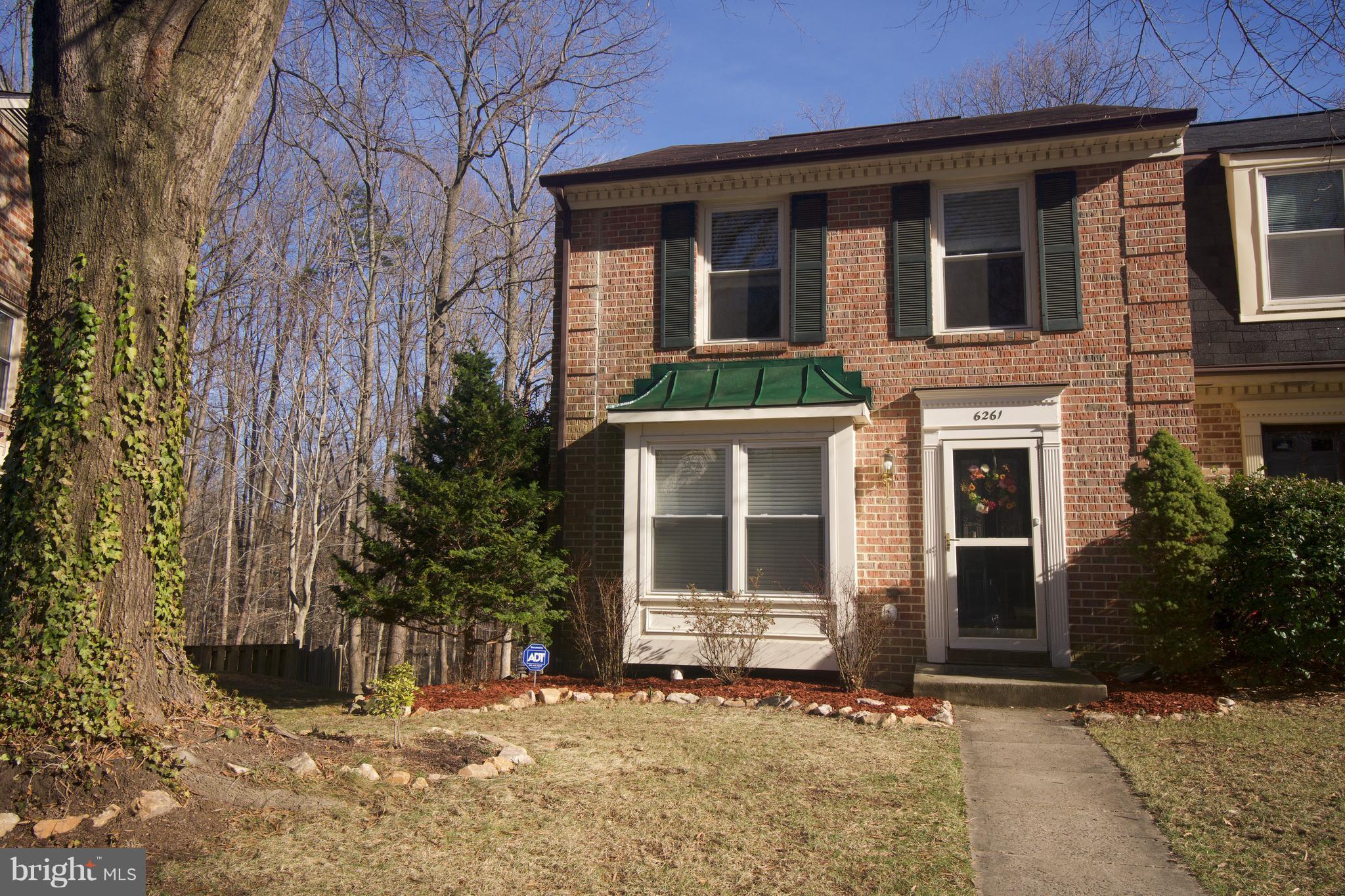 6261 Rathlin Drive Springfield, VA 22152 - Photo 1 of 26 a front view of a house with a yard