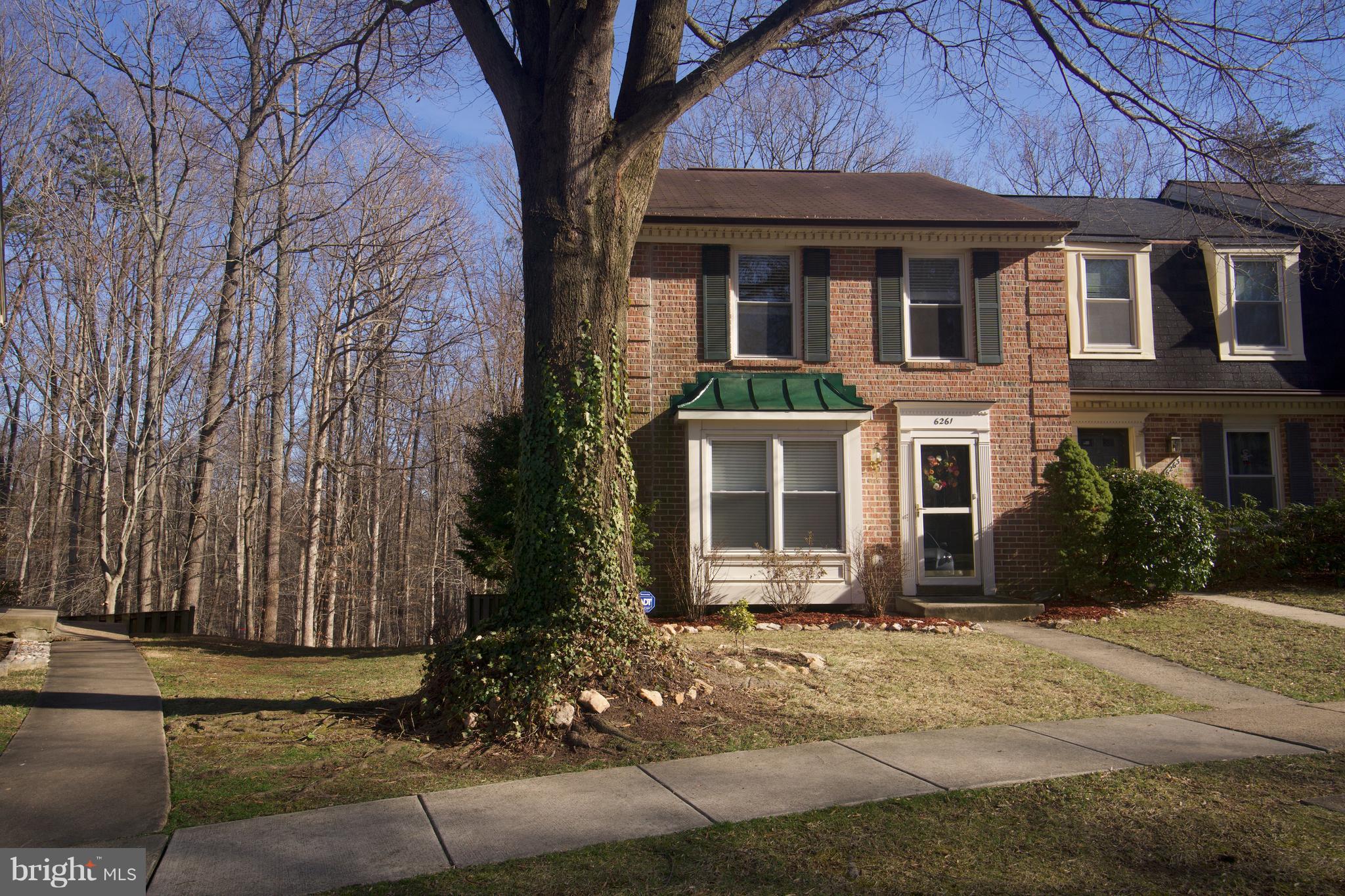 6261 Rathlin Drive Springfield, VA 22152 - Photo 2 of 26 a front view of a house with a yard